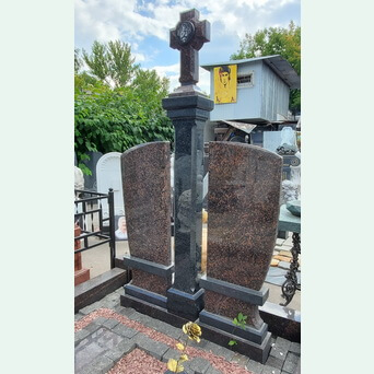 Памятник двойной с крестом на квадратной колонне из балтийского гранита